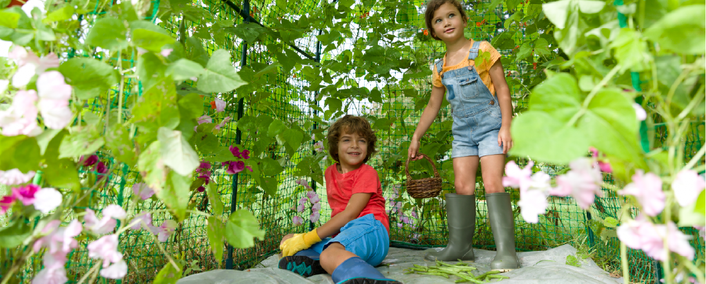Two children gardening.